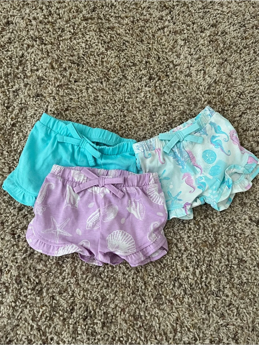 The Children’s Place Newborn 5 Bodysuits & 3 Shorts Set in Pastel Seashell Print